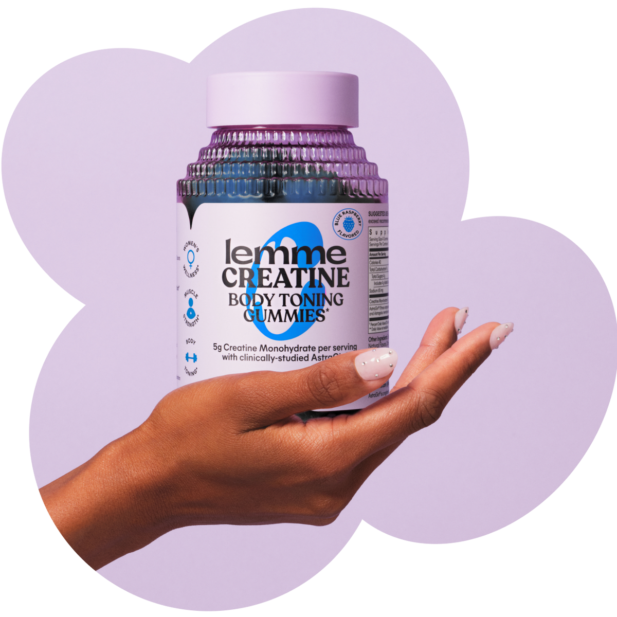 Hand holding a bottle of lemme Creatine Body Toning Gummies against a light purple background