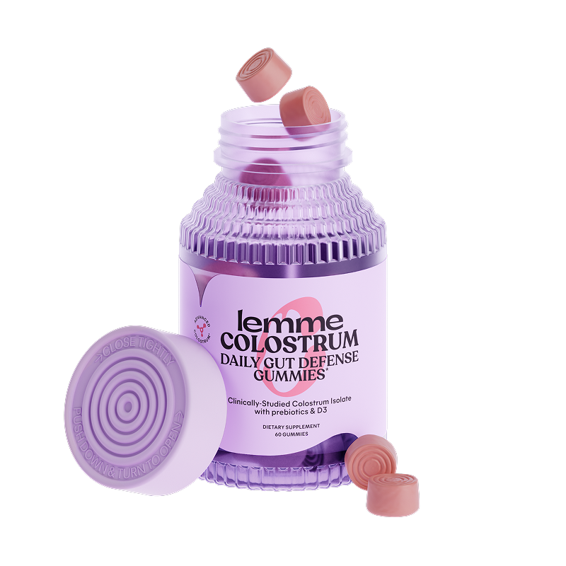 Purple bottle of lemme colostrum daily gut defense gummies on a white background