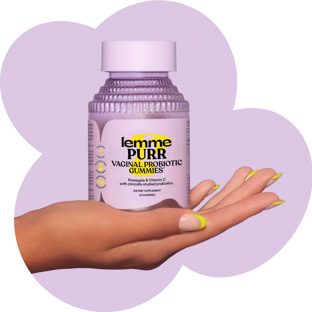 hand holding purple bottle of lemme gummies purr