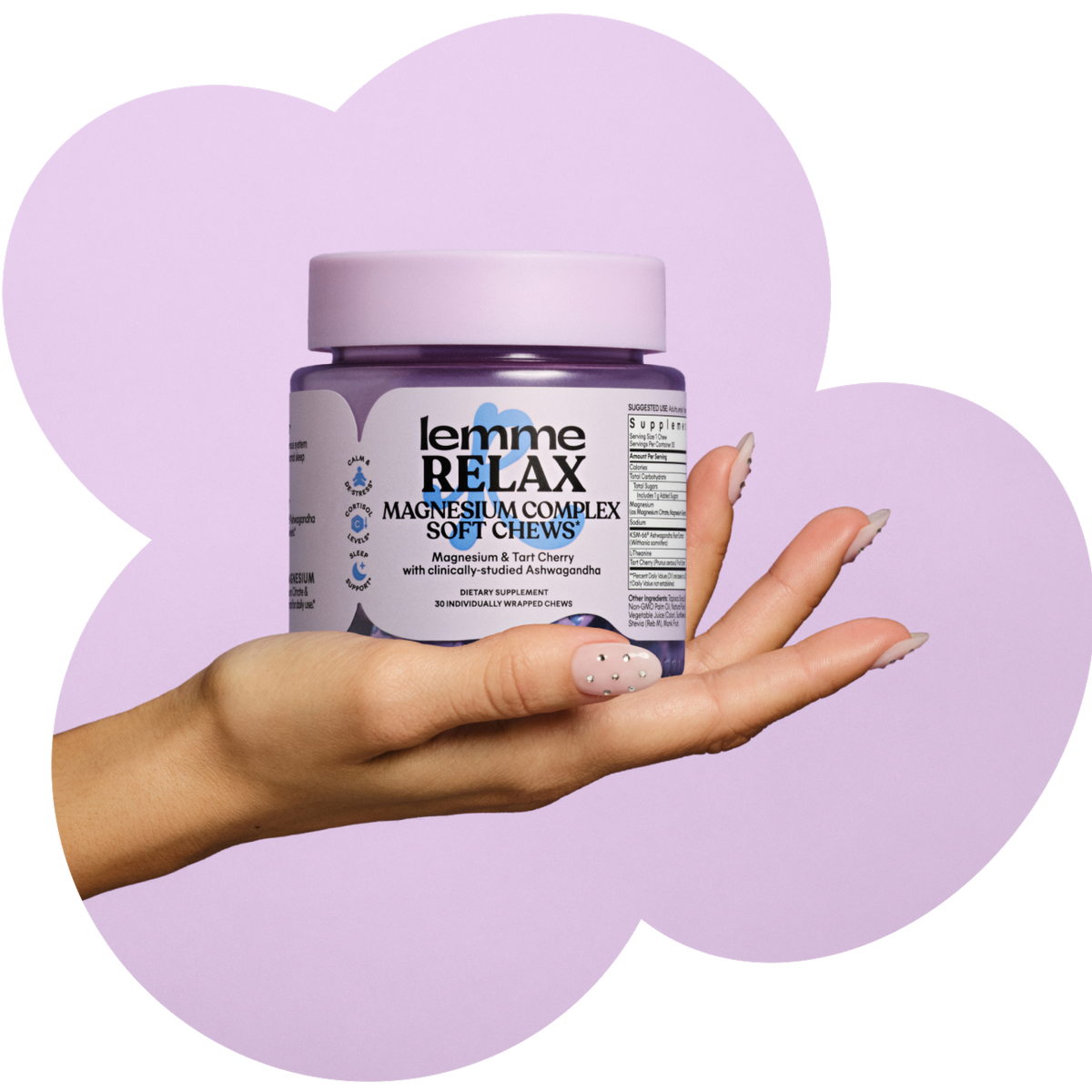 Hand holding a jar of 'lemme RELAX' magnesium complex soft chews against a purple background