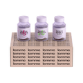Three bottles of 'lemme' products on a branded box with a black background